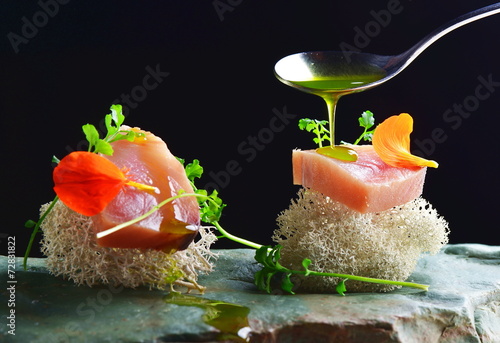 Fine dining, fresh raw ahi tuna sashimi served on sponge
