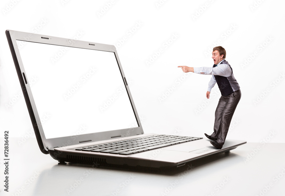 Afraid man points to the monitor Afraid man points to the monitor