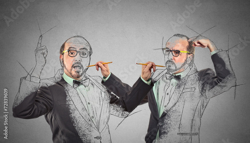 Εκτύπωση καμβά Middle aged man drawing with pencil self portrait picture sketch
