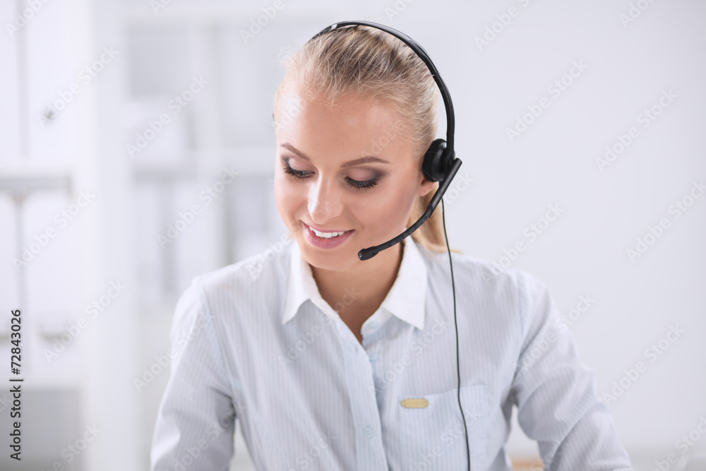 Portrait of beautiful businesswoman working at her desk with Portrait of beautiful businesswoman working at her desk with