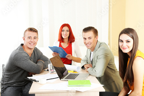 Group of people having meet...