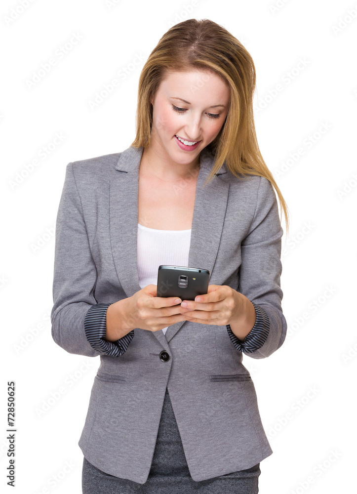 Businesswoman read the message on cellphone Businesswoman read the message on cellphone