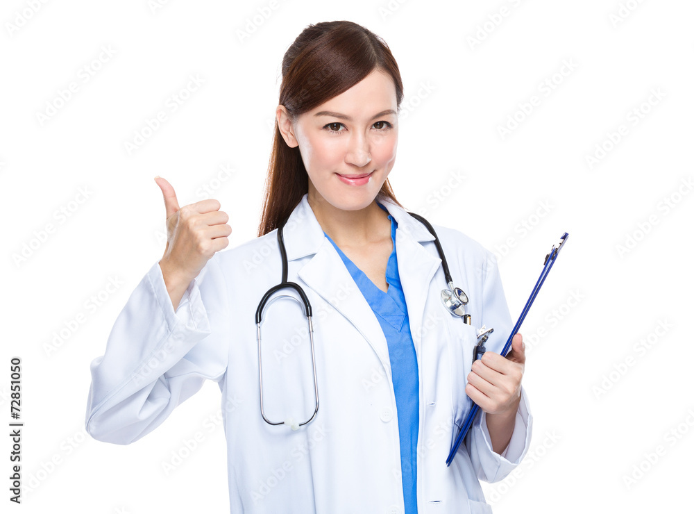Woman doctor with clipboard and thumb up Woman doctor with clipboard and thumb up