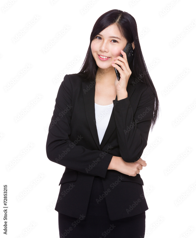 Businessswoman talk to mobile phone Businessswoman talk to mobile phone