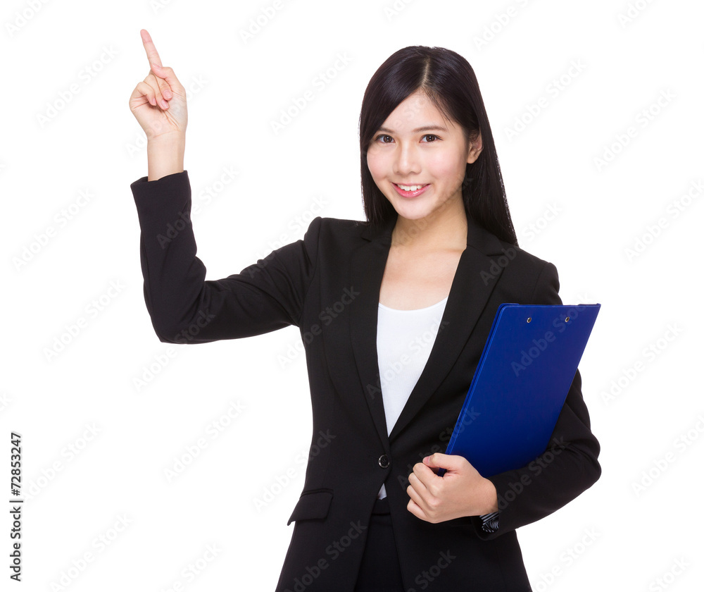 Businesswoman with clipboard and finger point up Businesswoman with clipboard and finger point up