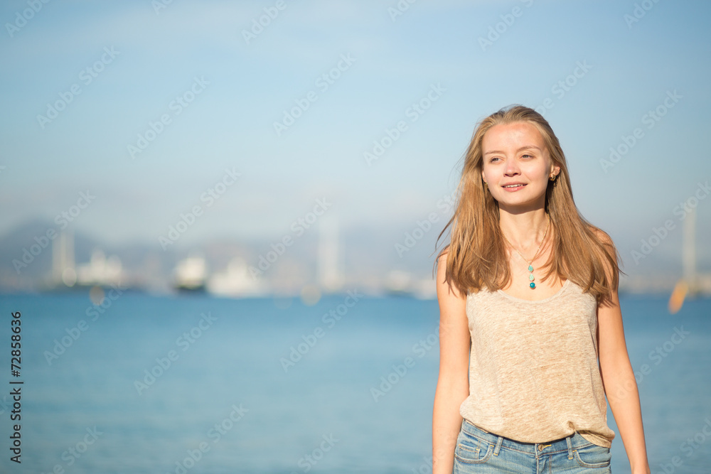 Beautiful young girl on the beach in Cannes Beautiful young girl on the beach in Cannes