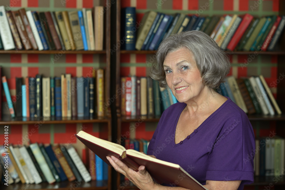 Beautiful elderly woman with book Beautiful elderly woman with book