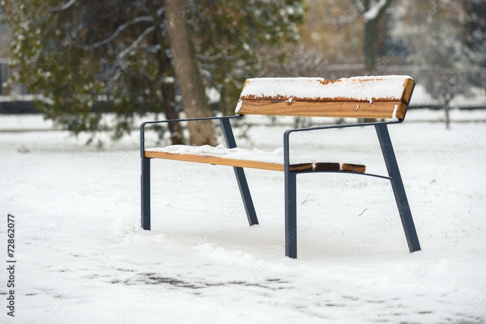 Wooden bench at winter