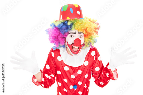 Happy male clown gesturing with hands