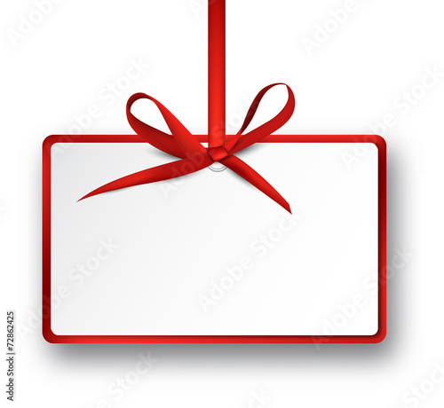White paper gift card with red satin bow.