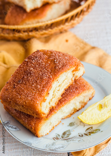 Wallpaper Mural lemon cinnamon buns on a white plate,breakfast Torontodigital.ca