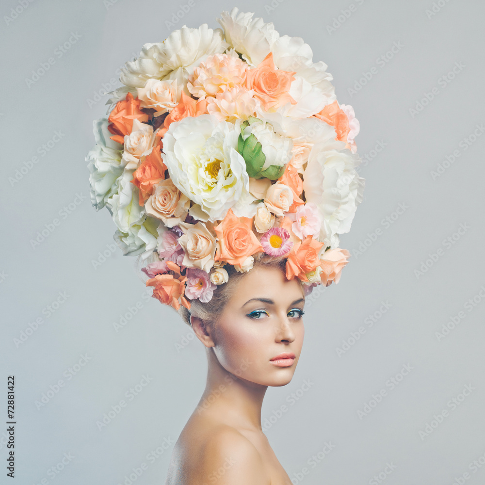 Beautiful woman with hairstyle of flowers