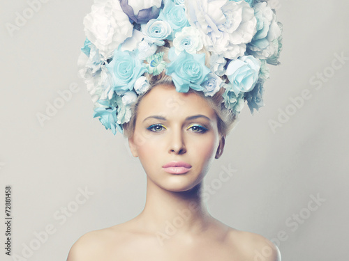 Beautiful woman with hairstyle of flowers