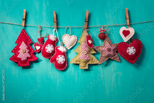 Christmas decorations handmade on turquoise background