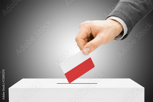 Voting concept - Male inserting flag into ballot box - Poland