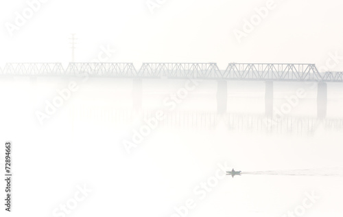 train bridge in fog