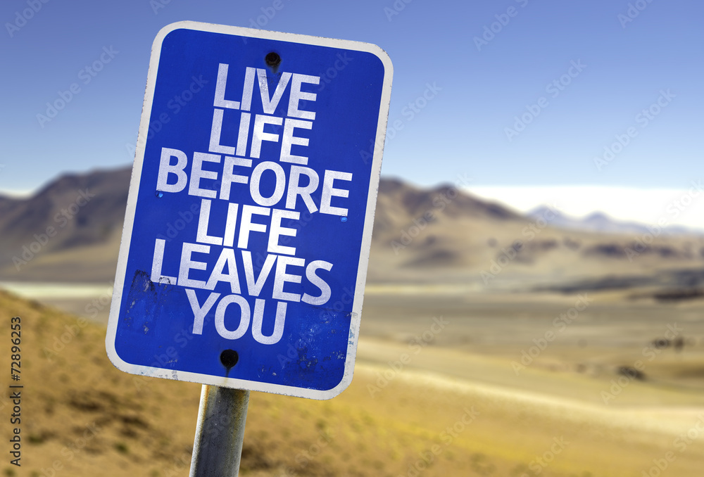 Live Life Before Life Leaves You sign with a desert Live Life Before Life Leaves You sign with a desert