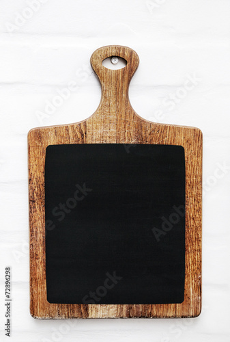 Old scratched cutting board. Rustic style kitchen