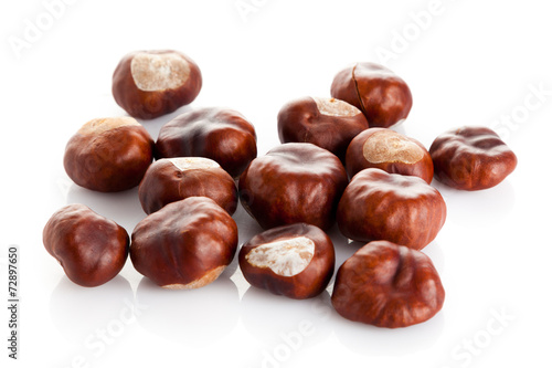 Chestnut on white background. ripe chestnuts