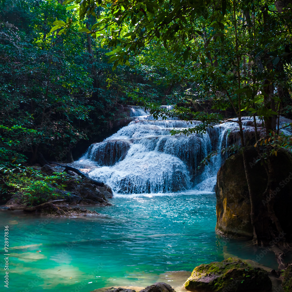 Naklejka premium Beautiful waterfall. Deep forest Waterfall.