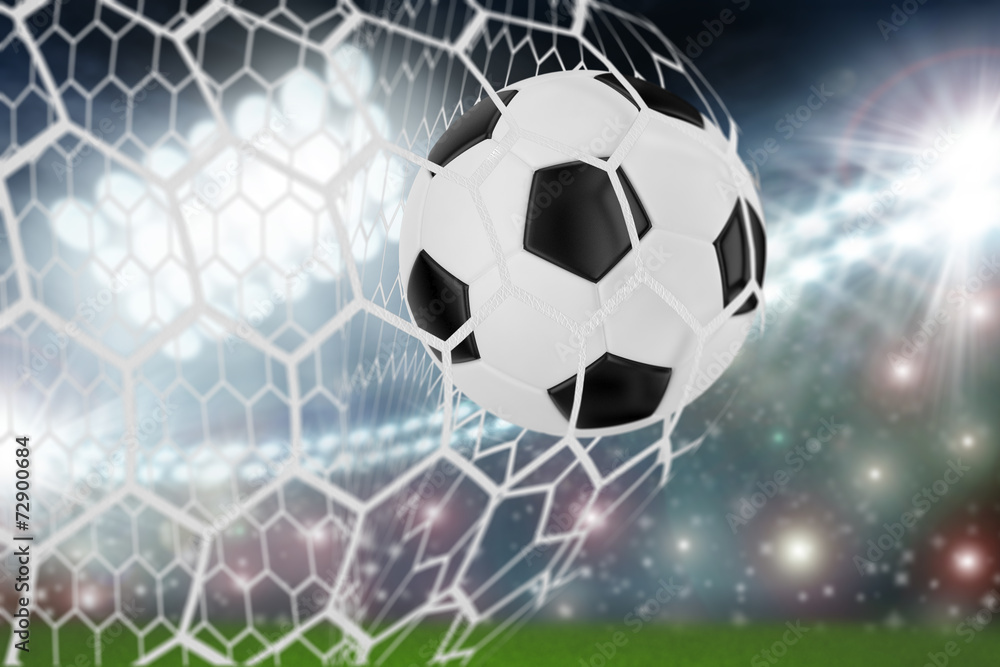 Fototapeta premium soccer ball in goal net