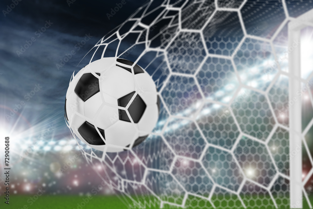 Fototapeta premium soccer ball in goal net