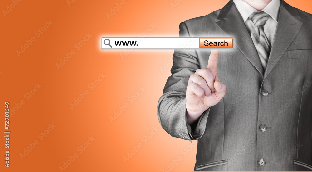 Businessman pushing virtual search bar Businessman pushing virtual search bar