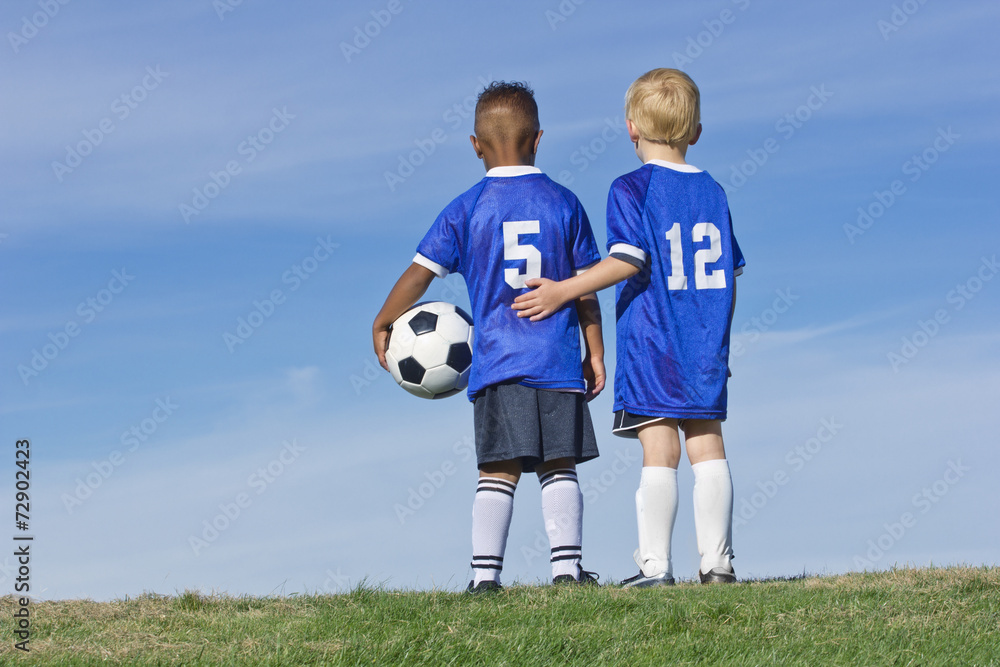 Obraz premium Youth Soccer Players standing together Rear View