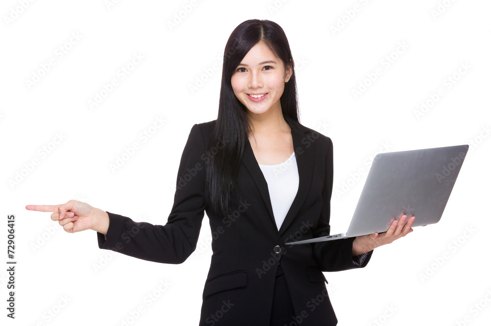 Businesswoman hold with laptop and finger point up Businesswoman hold with laptop and finger point up