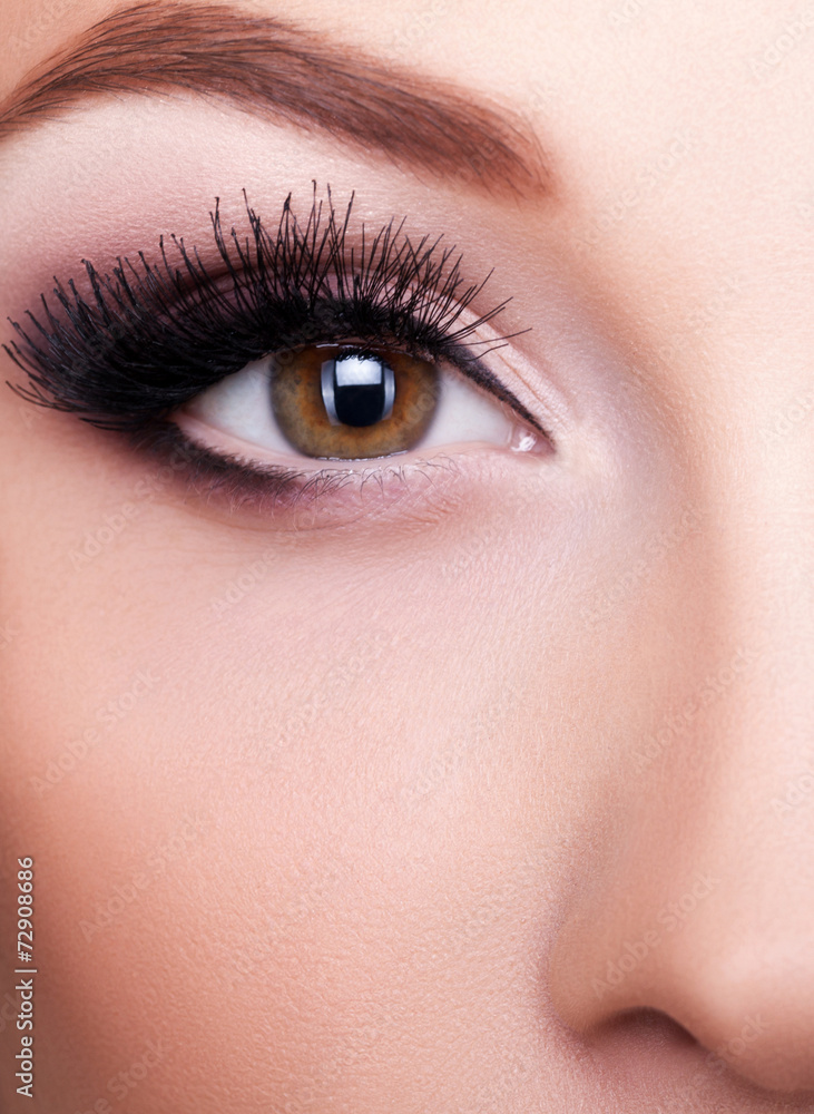 Eye with professional make up close up shooting