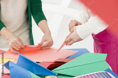 Women to work in colored paper