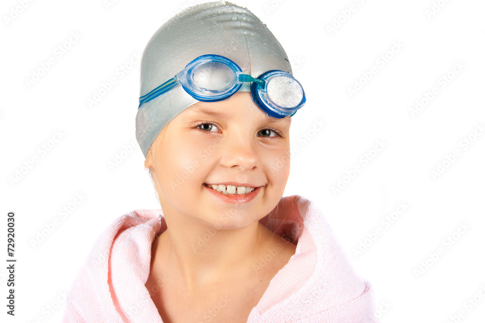 Portrait of a young girl in goggles and swimming cap. Isolated o Portrait of a young girl in goggles and swimming cap. Isolated o