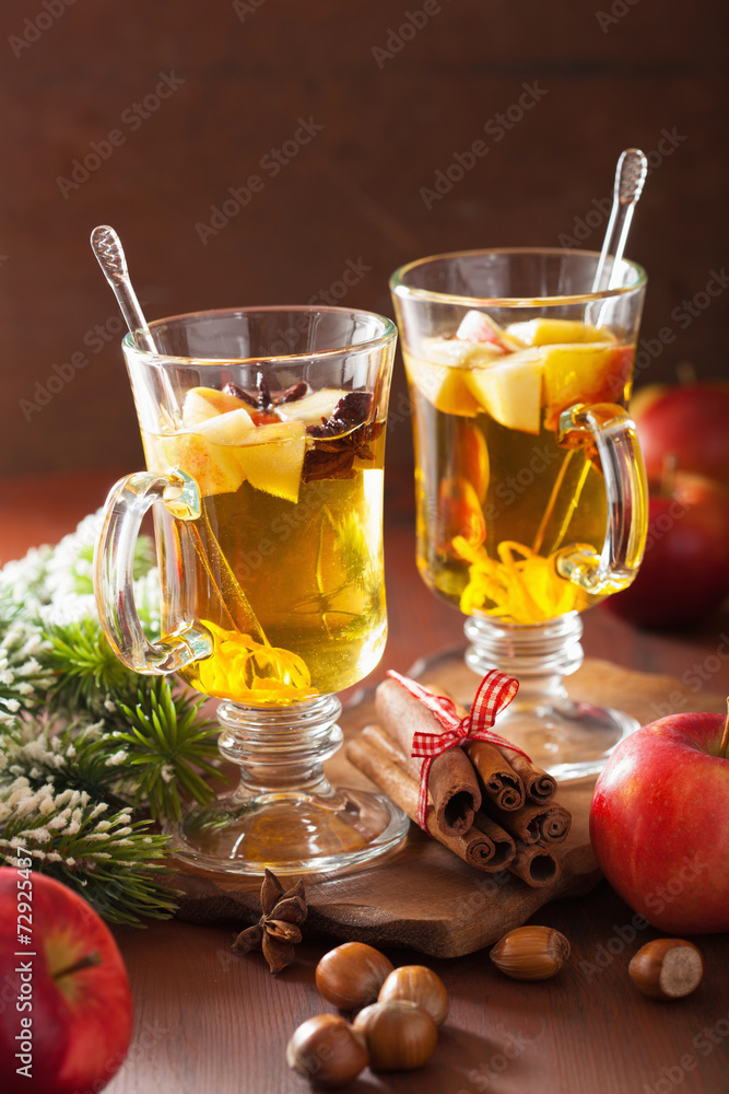 glass of mulled apple cider with orange and spices, christmas de glass of mulled apple cider with orange and spices, christmas de