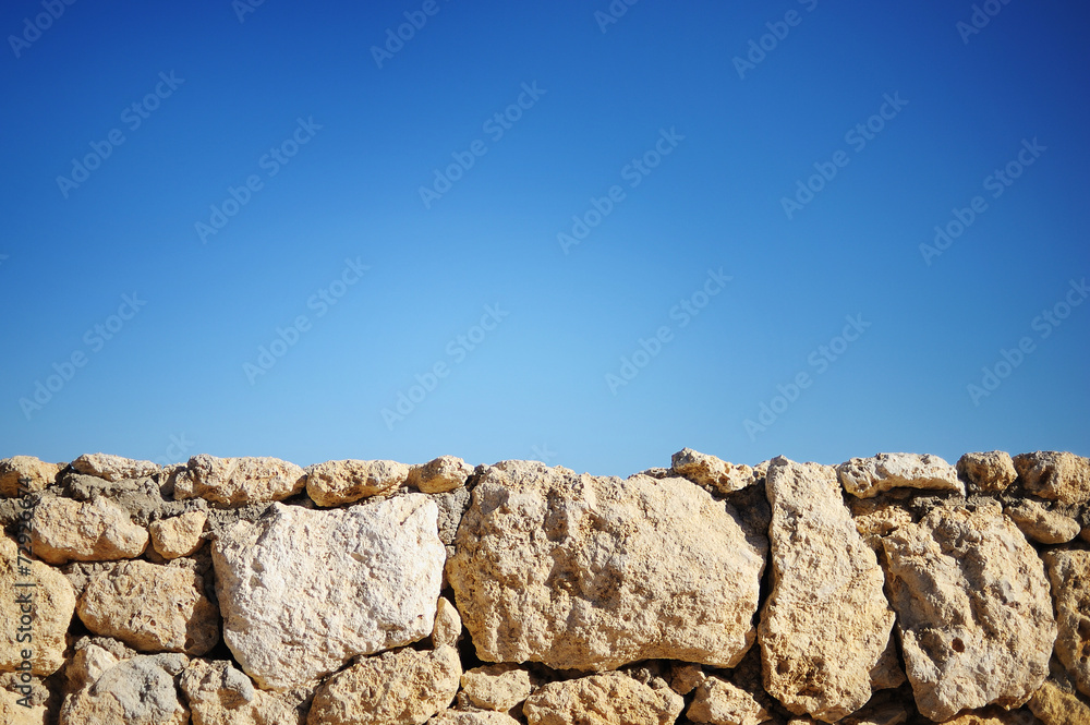 surface texture of stone wall decoration and blue sky surface texture of stone wall decoration and blue sky
