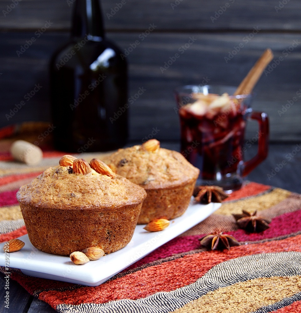 cup of hot Christmas mulled wine with cake cup of hot Christmas mulled wine with cake