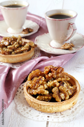 Two cups of coffee and a French dessert, Walnut caramel tart
