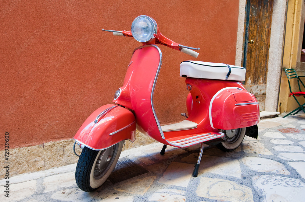 Scooter parked on Kerkyra street. Corfu island. Greece.