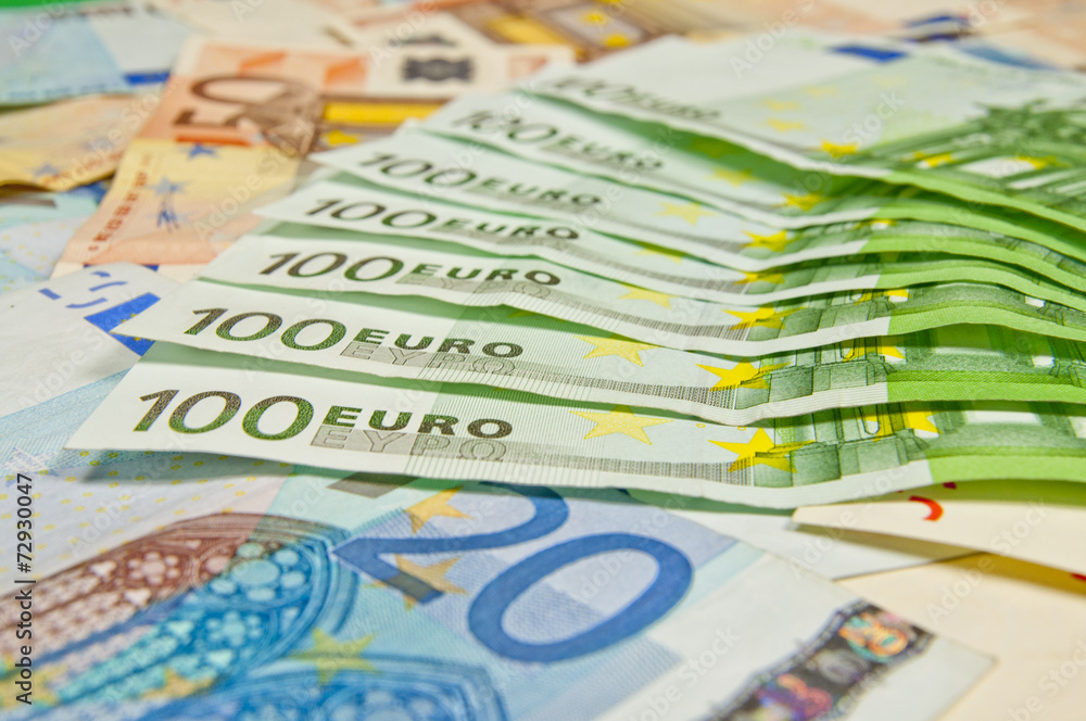 A lot of euro banknotes - large sum of money A lot of euro banknotes - large sum of money