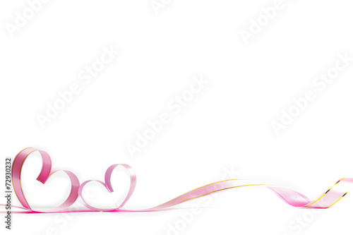 Ribbons shaped as hearts on white