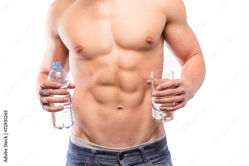 Muscular man torso with bottle and water Muscular man torso with bottle and water