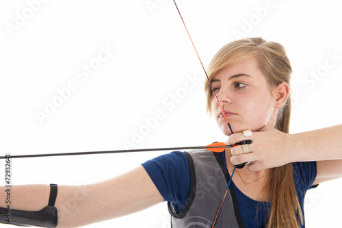 Girl holding a bow and arrow in closeup