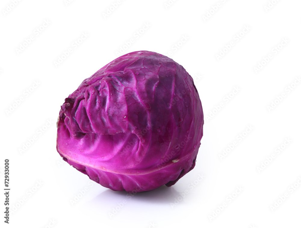 Head of red cabbage over white.