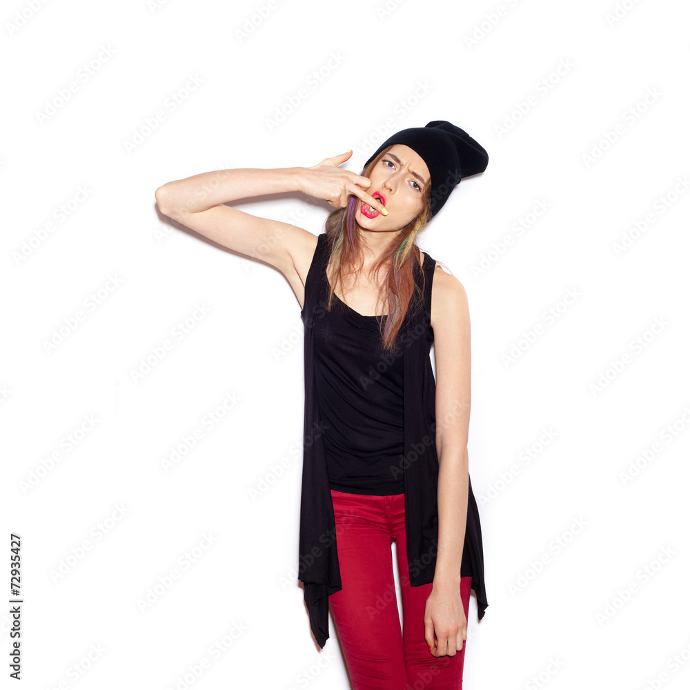 Young woman showing middle finger over white Young woman showing middle finger over white