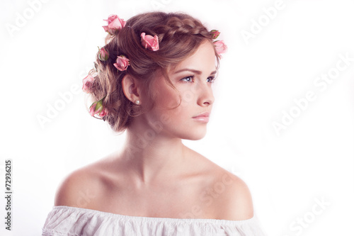 Beautiful Young model with floral delicate hairstyle