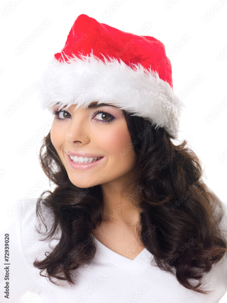 Friendly young woman in a red santa hat Friendly young woman in a red santa hat