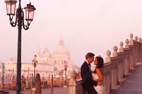 Beautiful wedding couple in Venice on their honeymoon