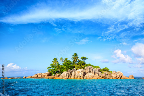 Tropical St. Pierre Island with palms and rocks, Seychelles