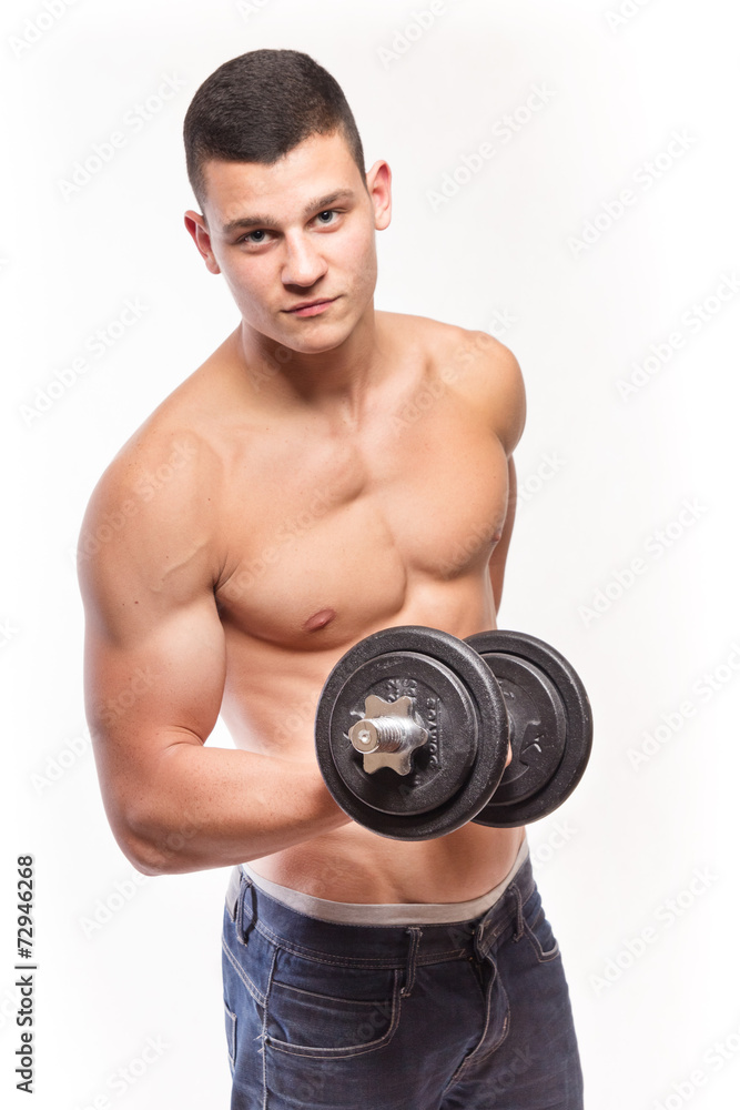 Muscular fitness man holding dumbbell Muscular fitness man holding dumbbell