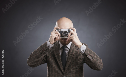 Man with vintage Camera