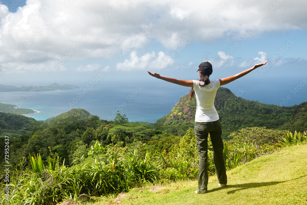 Young woman enjoying the view over rainforests